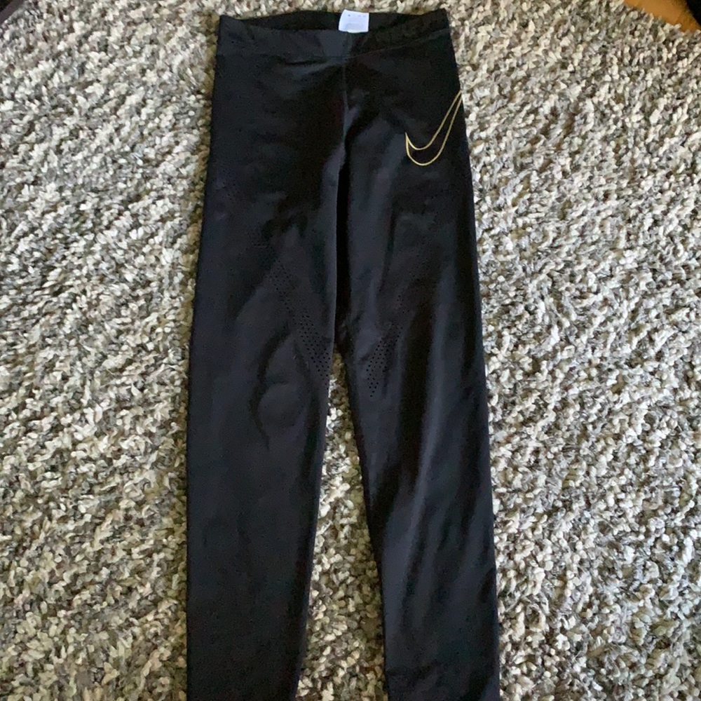 NIKE PRO leggings with gold nike symbol